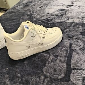 White Nike Air Force 1 Sneakers